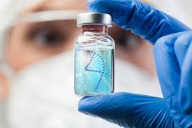 Lab professional holding a vial with a DNA representation